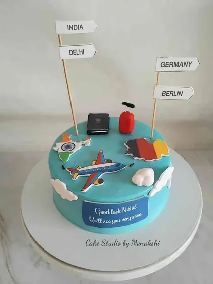 A travel themed cake for Nikhil, who was moving overseas. This cake wishes him good luck on his journey from Delhi, India to Berlin, Germany.
