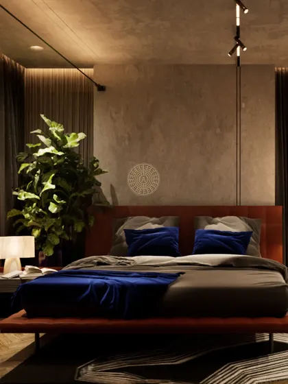 The room features a mix of warm wood flooring, textured rugs, and plenty of natural light. A large indoor plant brings a touch of nature indoors.
