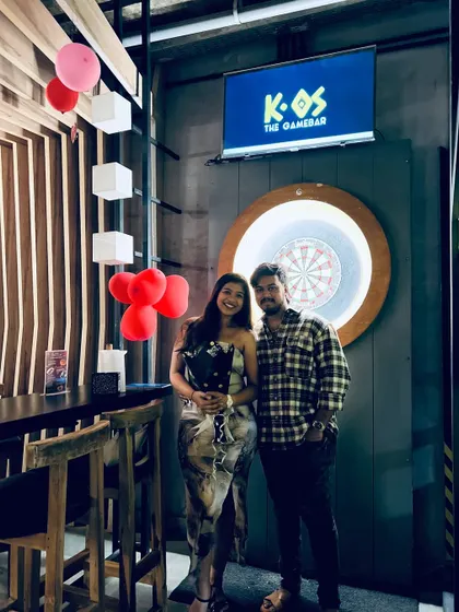 Celebrating love with a game of darts. Our gamebar is a popular spot for couples looking for a fun and interactive date night.
