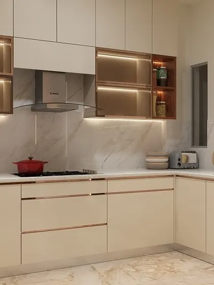 Here you can see the seamless L-shaped layout of the high-gloss kitchen. The design integrates the sink and cooking areas efficiently, providing ample counter space and maintaining a clean, uncluttered look.