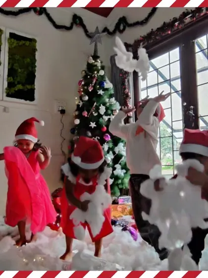 Children dance and play in the "snow" during our Christmas party.