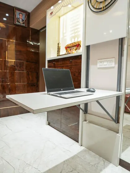 In Mumbai's compact homes, smart furniture is key. This is a great example of my "jugaad" approach: a multipurpose folding table that serves as a personal dining space, a study desk, or even an ironing table.