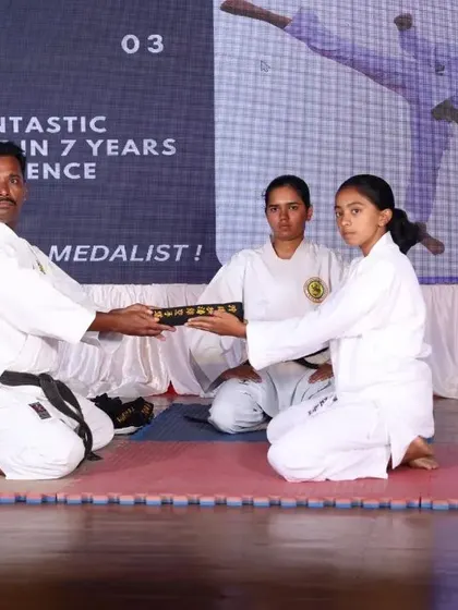 The moment a student receives their Kuro Obi is a sacred tradition. Here, I present a Shodan black belt, recognizing the culmination of years of hard work and perseverance.