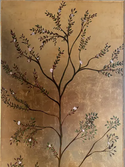 The completed gold leaf tree mural, before the final varnish was applied. This shows the raw texture and shine of the artwork.
