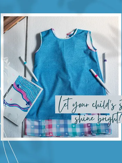 A graphic reminder to let your child's style shine bright, featuring my unique denim and check dress.