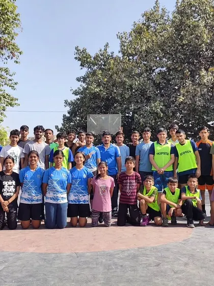 This is our team, our family. This group photo captures the spirit of our academy after a tough practice match. We foster a supportive community where players of all ages come together to push each other and grow.