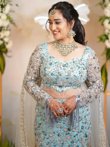 A close-up of Supriya, her happiness radiating. The delicate tassels on the blouse add a playful touch.