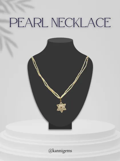 Effortlessly chic and endlessly versatile, this white gold necklace with a star-shaped pearl and diamond pendant is designed to complement every moment. Its subtle shimmer adds the perfect touch of sophistication.