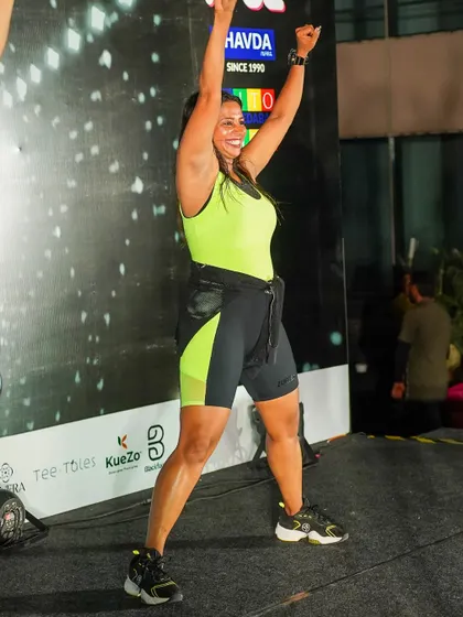 Arms up in celebration. The feeling of finishing a powerful routine is unbeatable.