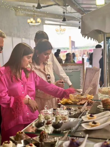 Guests browsing our extensive grazing table at the luxe shopping pop-up.