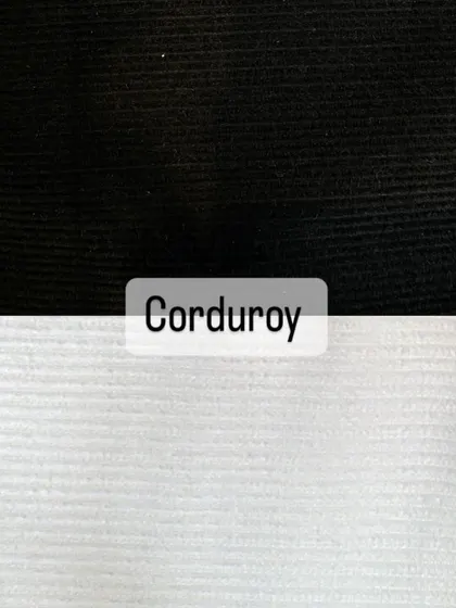Swatches of my corduroy fabric, available in classic colors like black and white. This soft, ribbed fabric is perfect for custom trousers and jackets.