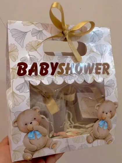 This adorable teddy bear baby shower hamper comes in a custom box with 3D teddy bears and a window to see the gifts inside.