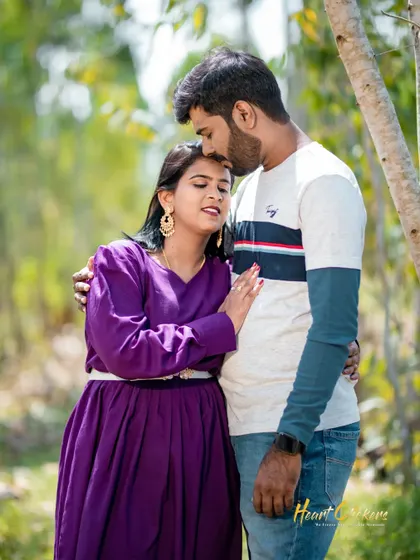 A tender pre-wedding embrace. The natural light and outdoor setting create a soft and romantic mood.
