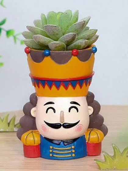 This King Nutcracker resin planter is a festive and fun option for your small plants. It's a great decorative piece, especially around the holidays.