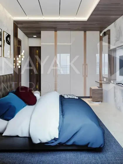 Your bedroom should be your personal sanctuary. We layered textures, from the tufted headboard to the plush bedding, and used a mix of ambient and focused lighting to create a tranquil retreat that feels both spacious and intimate.