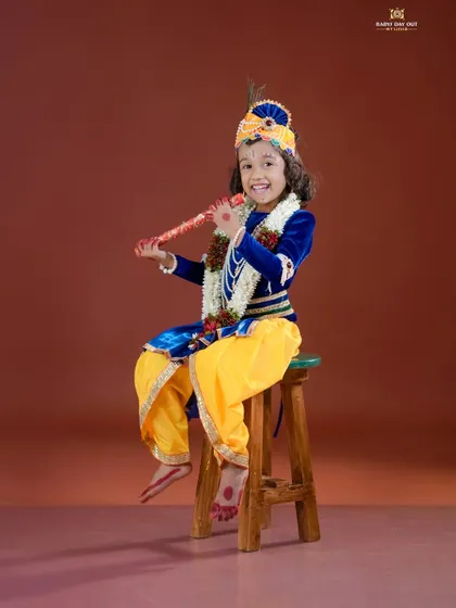 A joyful little Krishna playing his flute. We capture the playful and divine spirit of this beloved character.
