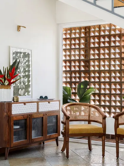 Pieces from the Dhara Residence, including the Ruba Bar Chair, Sirutha console, and Ruba armchair. This project highlights our ability to create contemporary yet warm furniture that complements modern architecture.