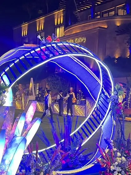 A truly out-of-this-world photo opportunity. For this celestial-themed sangeet, I created this installation with a spherical structure and large, glowing crystals, making guests feel like they're posing in another galaxy.
