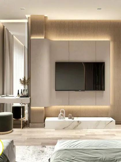 Another angle of the TV and dressing area, highlighting the ambient backlighting and the elegant combination of materials.