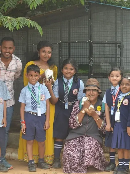 A picture-perfect moment with our young visitors and some of our feathered and furry friends. We believe these interactions help foster a sense of compassion and respect for all living things.
