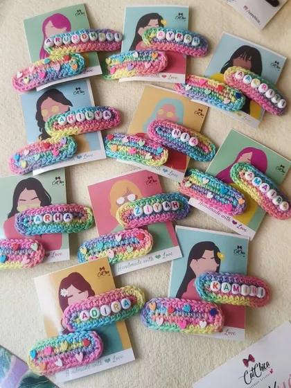 A sea of color and names! We take so much pride in crafting these personalized clips for each and every child.