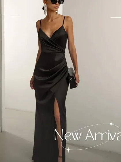 Introducing the GIANNA dress, a classic black satin gown for when you need to make a statement. The design is focused on a clean silhouette, with a wrap-style bodice and a high slit that creates beautiful movement as you walk.