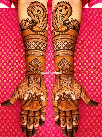 A perfectly symmetrical design for both hands, showcasing majestic peacocks and delicate parrots. Achieving symmetry is a crucial skill that we practice extensively in my classes.