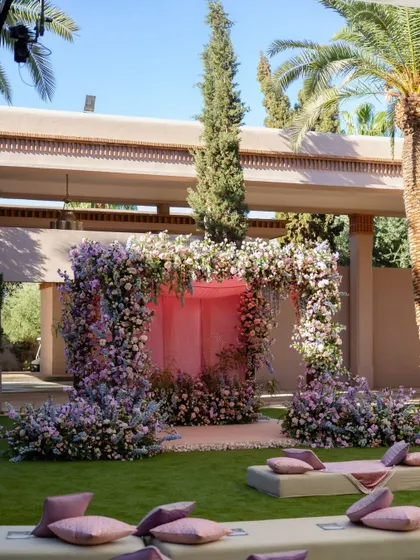 The floral-draped setting for the Anand Karaj in Marrakech. We used a soft, pastel color palette to complement the garden sanctuary and create a space that felt sacred and pure.