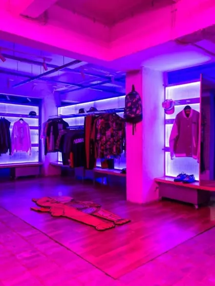 The store transformed into an event space, with the vibrant lighting creating an immersive, club-like atmosphere.