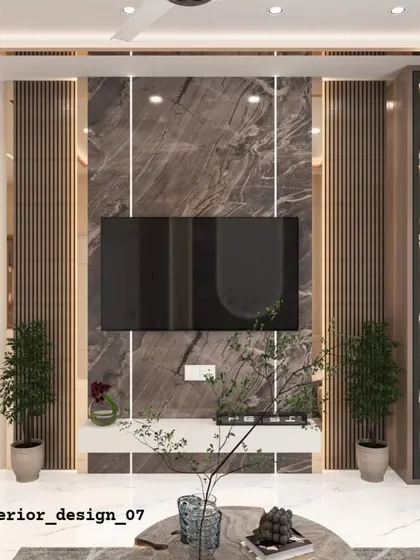 A living room TV wall that balances dark marble, wood fluting, and metallic accents. The integrated planters on the console bring a touch of nature indoors.