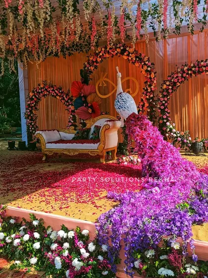 This magnificent floral peacock was the star of a Sangeet night. The vibrant purple and pink flowers cascading down created a truly unique and breathtaking centerpiece for the event.