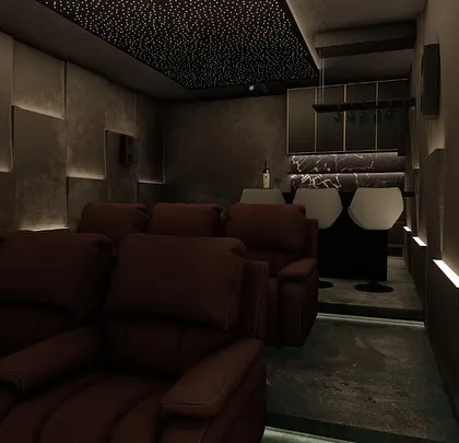 A different perspective of the theater with an integrated bar, showing how the spaces flow together while maintaining a clear distinction between the viewing and social areas.