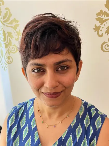 A textured pixie for Neha, with a hint of color for added dimension.