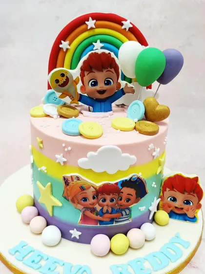We bring the cheerful world of Cocomelon to life with this colorful and fun-filled cake. Featuring JJ and other beloved characters amidst rainbows, stars, and balloons, this design is a joyful celebration perfect for a toddler's birthday party.