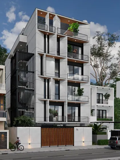 For this 9000 sq ft residence, we designed each floor as an individual apartment for the family. The facade's simplicity is elevated by chamfered concrete walls and vertical planes that soften its linear height and create a balanced, modern aesthetic.