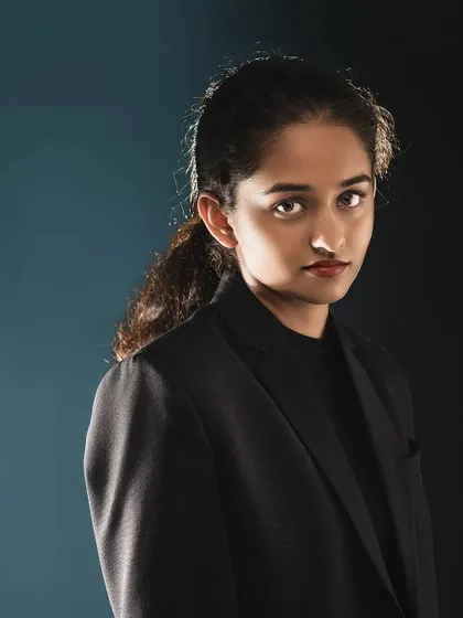 A more formal, moody studio portrait. Here, I used a specific lighting setup to create deep shadows and a strong, focused look, perfect for a professional headshot or portfolio.