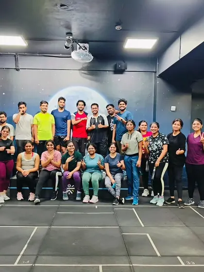 The heart and soul of my classes. Each photo captures a unique moment with my incredible community after a sweaty, joyful session. This is our shared victory lap.