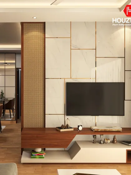 This TV unit design blends multiple textures, including white marble with gold inlay, natural wood, and rattan. The asymmetric console provides both open and closed storage for a functional and stylish look.