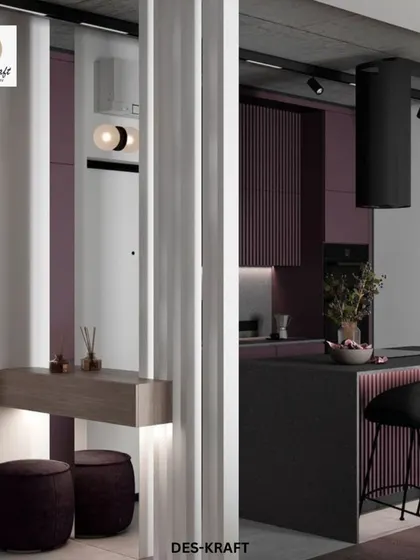 This shot shows the entryway console, which subtly introduces the plum color palette used in the adjoining kitchen, creating a cohesive design story from the moment you enter.