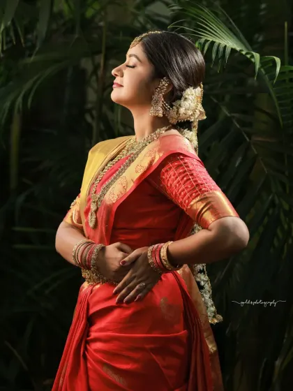 A behind-the-scenes and final look from a makeup artist's portfolio shoot. The model is in a classic red bridal saree, showcasing the transformation and the beautiful final result.