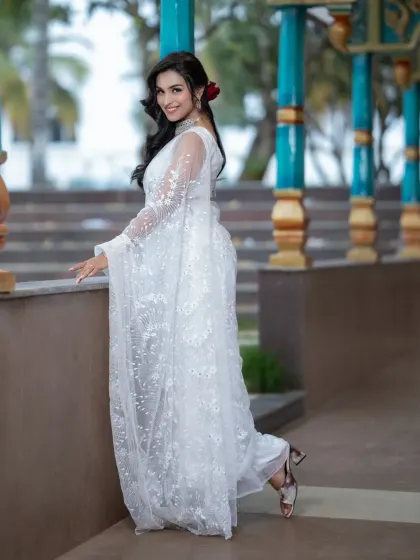 A fun and playful pose. The makeup is versatile enough to look great in both formal and candid photos.