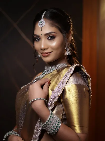 This is the complete Muhurtham look demonstrated for our students, showcasing the harmony between the makeup, jewelry, and traditional attire.