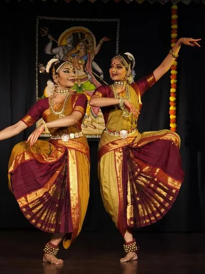 A moment of perfect synchronicity during a duet performance for World Dance Day. Dancing with a partner brings a unique dynamic of contrast and connection to the stage.