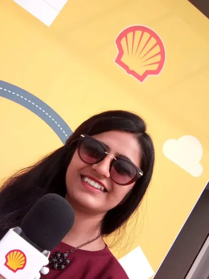 A smile is your best logo. A quick selfie while hosting for Shell. Whether it's a large-scale competition or a corporate presentation, I always bring my authentic energy and a smile to represent the brand I'm working with.