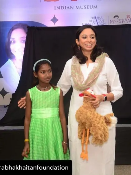 A proud moment with a young participant after a puppetry workshop. These sessions help children develop self-expression, confidence, and stronger communication skills.