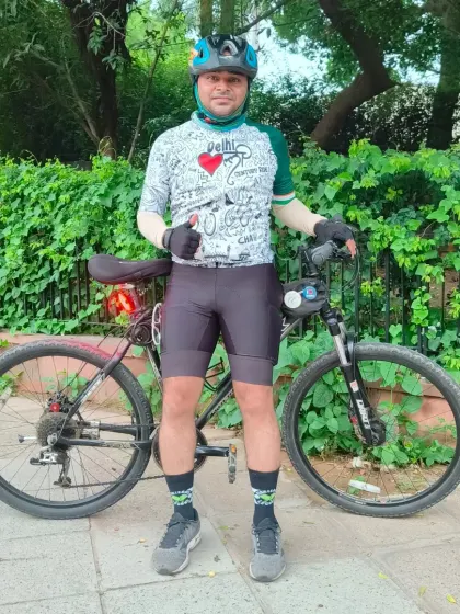 A thumbs-up from a rider in our signature "I Love Delhi" jersey.