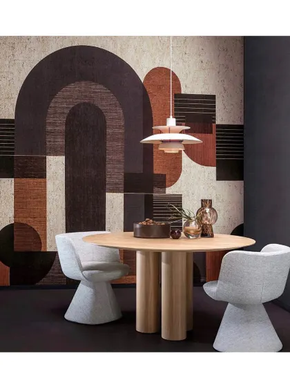 This panoramic design is printed on a layer of cork streaked with gold accents, combining geometric modernity with natural texture. It's a sophisticated choice for a contemporary dining area.