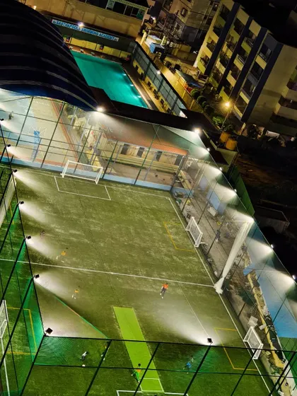 Welcome to our home. This is our modern, professional-grade football turf, fully equipped with bright floodlights for exciting evening and night sessions.
