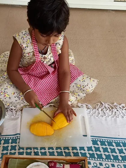 A collage of moments from our mango-themed cooking sessions, where children learned to peel, slice, and prepare delicious mango treats like milkshakes and cheesecake.