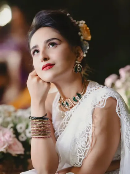 A collection of outfits perfect for any celebration. From intricate lehengas to shimmering sarees, these pieces are designed to ensure you are the best dressed guest at any event.